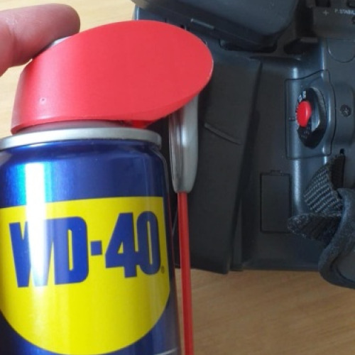 Kamera gomb WD40
